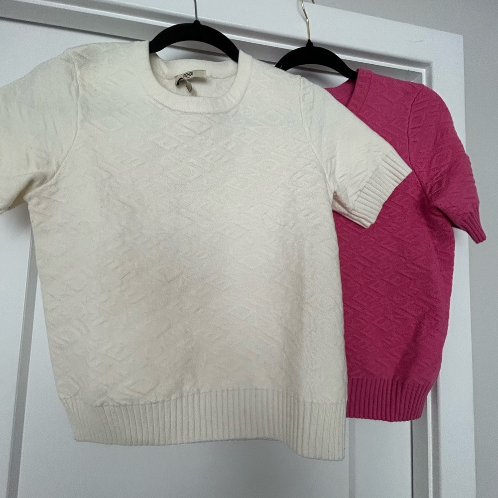 Logomania sweater worn once. Price accordingly.